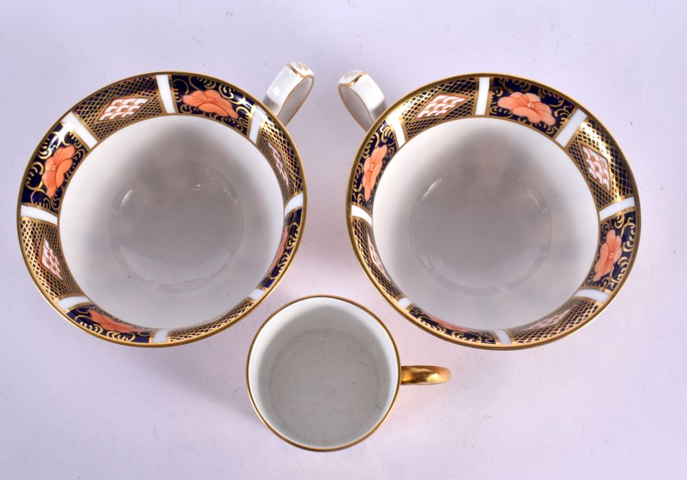 Early 20th century Royal Crown Derby pattern 1128, two cups, saucers and side plates. Plates 16cm d - Image 8 of 9