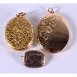 TWO 9CT GOLD LOCKETS TOGETHER WITH A VICTORIAN GOLD MOURNING BROOCH. Stamped 9CT, largest 4.8cm x 3