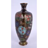 A 19TH CENTURY JAPANESE MEIJI PERIOD CLOISONNE ENAMEL VASE decorated with floral roundels. 19 cm hig