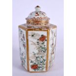 A 19TH CENTURY JAPANESE MEIJI PERIOD PORCELAIN TEA CADDY AND COVER painted with flowers. 11 cm high.