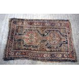 A small Persian rug 123 x 83 cm