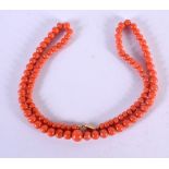 A CORAL NECKLACE. Length 47cm, largest bead 6.6mm, weight 21.4g