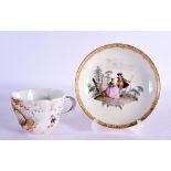 AN ANTIQUE MEISSEN PORCELAIN CUP AND SAUCER. 11 cm diameter.