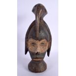 AN AFRICAN TRIBAL CARVED BIRD OVERLAID MASK. 27 cm high.