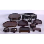 ASSORTED CHINESE HARDWOOD STANDS in various forms and sizes. Largest 20 cm wide. (qty)