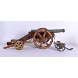 THREE VINTAGE COUNTRY HOUSE CANNONS in various forms and sizes. Largest 55 cm x 20 cm. (3)