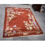 A large Indian wool rug 269 x 240 cm.