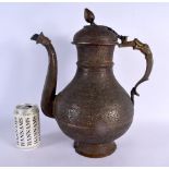 A LARGE 18TH CENTURY MIDDLE EASTERN ISLAMIC BRONZE EWER decorated all over with foliage and vines. 3