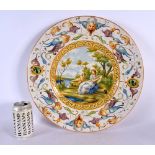 A LARGE 19TH CENTURY EUROPEAN MAJOLICA CHARGER painted with figures. 42 cm diameter.