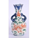 A SMALL 18TH CENTURY JAPANESE EDO PERIOD TWIN HANDLED PORCELAIN VASE painted with dragons. 9 cm high