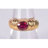 A SILVER GILT GEM SET RING. 3.9 grams. M.