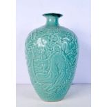 A Chinese porcelain Celadon MEIPING vase decorated in relief with Immortals 32cm .