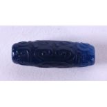 A CHINESE CARVED BLUE AGATE ZHU BEAD 20th Century. 3.5 cm long.