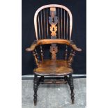Amid 19th century yew and Elm broad arm Winsor chair 110 x 65 x 62 cm.