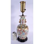 A LARGE 19TH CENTURY CHINESE FAMILLE ROSE CANTON PORCELAIN LAMP Qing. 51 cm high.