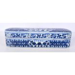 A Chinese porcelain blue and white pen box 8 x 32 cm .