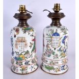 A RARE PAIR OF 19TH CENTURY FRENCH ENAMELLED MILK GLASS COUNTRY HOUSE LAMPS. 30 cm high.