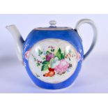 A RARE 19TH CENTURY RUSSIAN PORCELAIN TEAPOT AND COVER painted with flowers. 21 cm x 15 cm.