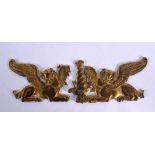 A FINE PAIR OF GEORGE III BRONZE GRIFFIN LION PLAQUES modelled recumbent. 15 cm x 8 cm.