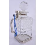 AN UNUSUAL BETJEMENS PATENT SINGLE CUT GLASS DECANTER. 24 cm high.