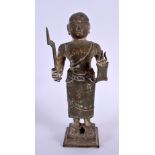 A 17TH/18TH CENTURY MIDDLE EASTERN SOUTH EAST ASIAN BRONZE BUDDHA modelled holding an axe. 21 cm hig