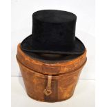 A cased Charles Weir top hat Circumference 54 cm.