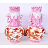 A pair of elephant handle Chinese porcelain vases decorated with Dragons 23 cm (2).