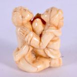 A JAPANESE EROTIC BONE NETSUKE. 4 cm x 3.5 cm.