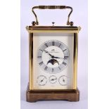 A MATTHEW NORMAN MULTI DIAL REPEATING CARRIAGE CLOCK. 17 cm high inc handle.