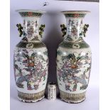 A LARGE PAIR OF 19TH CENTURY CHINESE TWIN HANDLED FAMILLE ROSE VASES Qing. 60 cm x 22 cm.