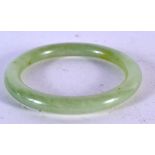 A CASED CELADON JADE BANGLE. 6cm internal diameter