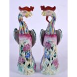 A PAIR OF CHINESE REPUBLICAN PERIOD FAMILLE ROSE HOHO BIRDS. 17 cm high.