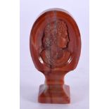 AN 18TH/19TH CENTURY EUROPEAN CARVED BLOODSTONE PORTRAIT SEAL. 5.5 cm high.