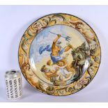 A 19TH CENTURY ITALIAN MAJOLICA FAIENCE GLAZED POTTERY DISH painted with mythical scenes. 34 cm diam