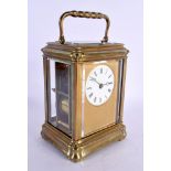 A 19TH CENTURY FRENCH REPEATING BRASS CARRIAGE CLOCK. 17.5 cm high inc handle.