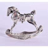 A SILVER ROCKING HORSE. 13.8 grams. 4 cm x 3.25 cm.