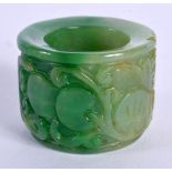A CHINESE CARVED JADEITE ARCHERS RING 20th Century. 4 cm wide.