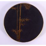 AN EARLY 20TH CENTURY JAPANESE TAISHO PERIOD MIXED METAL DISH by Ogurusu, decorated with bamboo. 10.