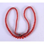 A BLOOD RED CORAL NECKLACE. 53 cm long.