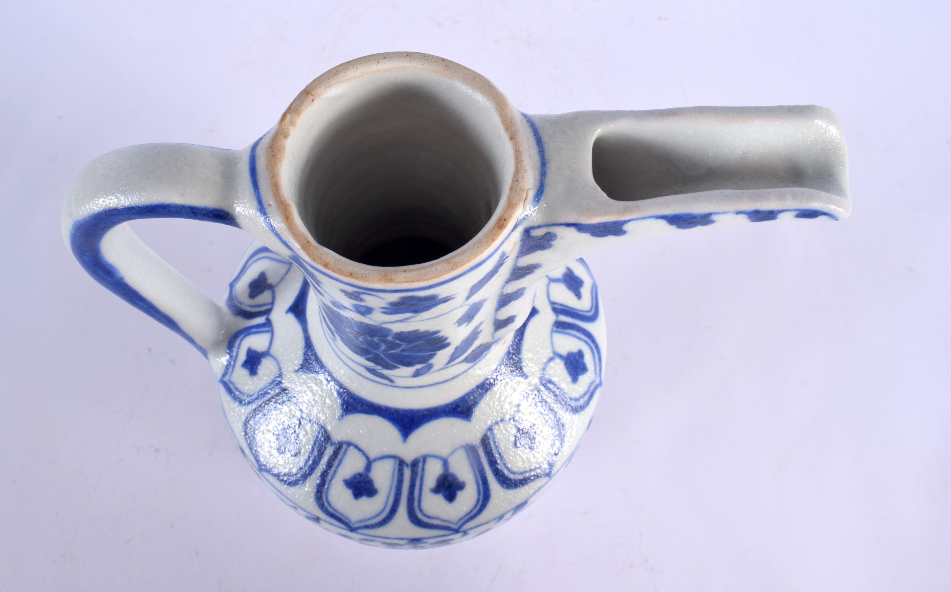 A TURKISH ISLAMIC BLUE AND WHITE WATER JUG. 27 cm high. - Image 3 of 4