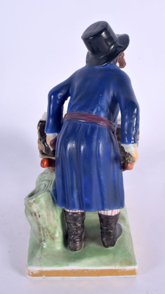 A RARE ANTIQUE RUSSIAN PORCELAIN FIGURE OF A MALE modelled holding a barrow upon a naturalistic base - Image 4 of 5