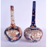 TWO 19TH CENTURY JAPANESE IMARI BOTTLE NECK VASES. Largest 24 cm high. (2)