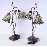A pair of metal lampstands with Tiffany style shades 73 x 53 cm.