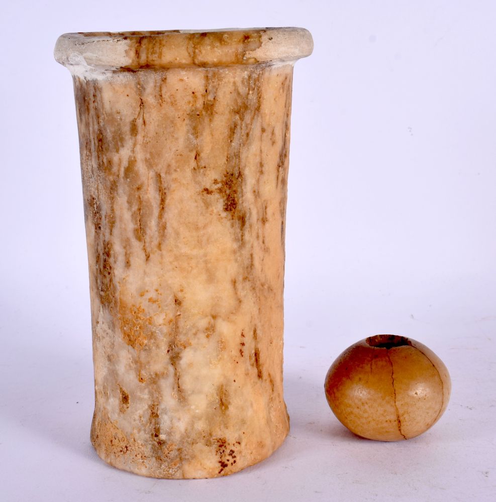 AN EARLY EGYPTIAN CARVED CALCITE FUNERARY VESSEL C2700-2500 BC , together with a smaller carved alab