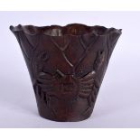 A 19TH CENTURY CHINESE CARVED BAMBOO LIBATION CUP Kangxi style. 10 cm x 8 cm.