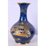 A CARLTONWARE VASE painted with Oriental scenes. 17 cm high.