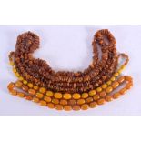 3 AMBER TYPE BEAD NECKLACES. Longest 200cm