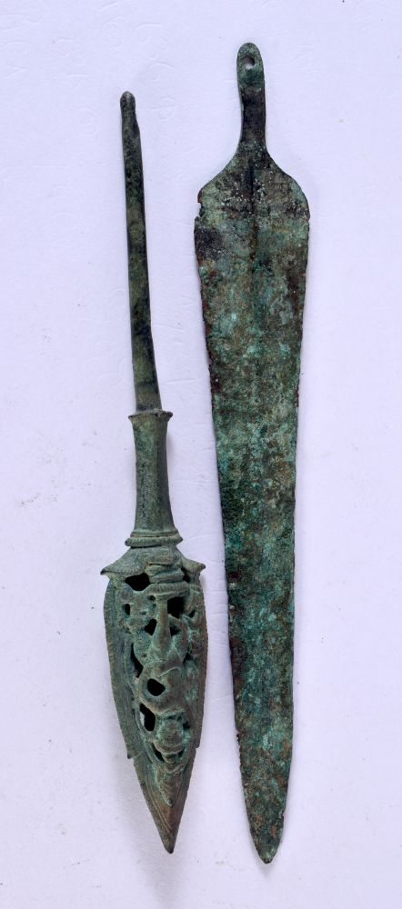 AN EARLY BRONZE ASIAN FLAMING FINIAL and a blade. Largest 20 cm x 2.75 cm. (2)