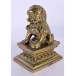A 19TH CENTURY CHINESE BRONZE FIGURE OF A SEATED DOG OF FOE Qing. 11 cm x 6 cm.