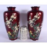 A LARGE PAIR OF EARLY 20TH CENTURY JAPANESE MEIJI PERIOD CLOISONNE ENAMEL VASES decorated with flowe